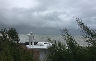 Statue looking out to sea