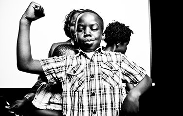 Young Boy Standing Up