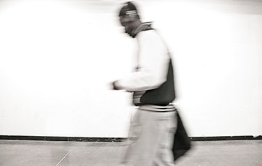 Guy Walking In Black And White